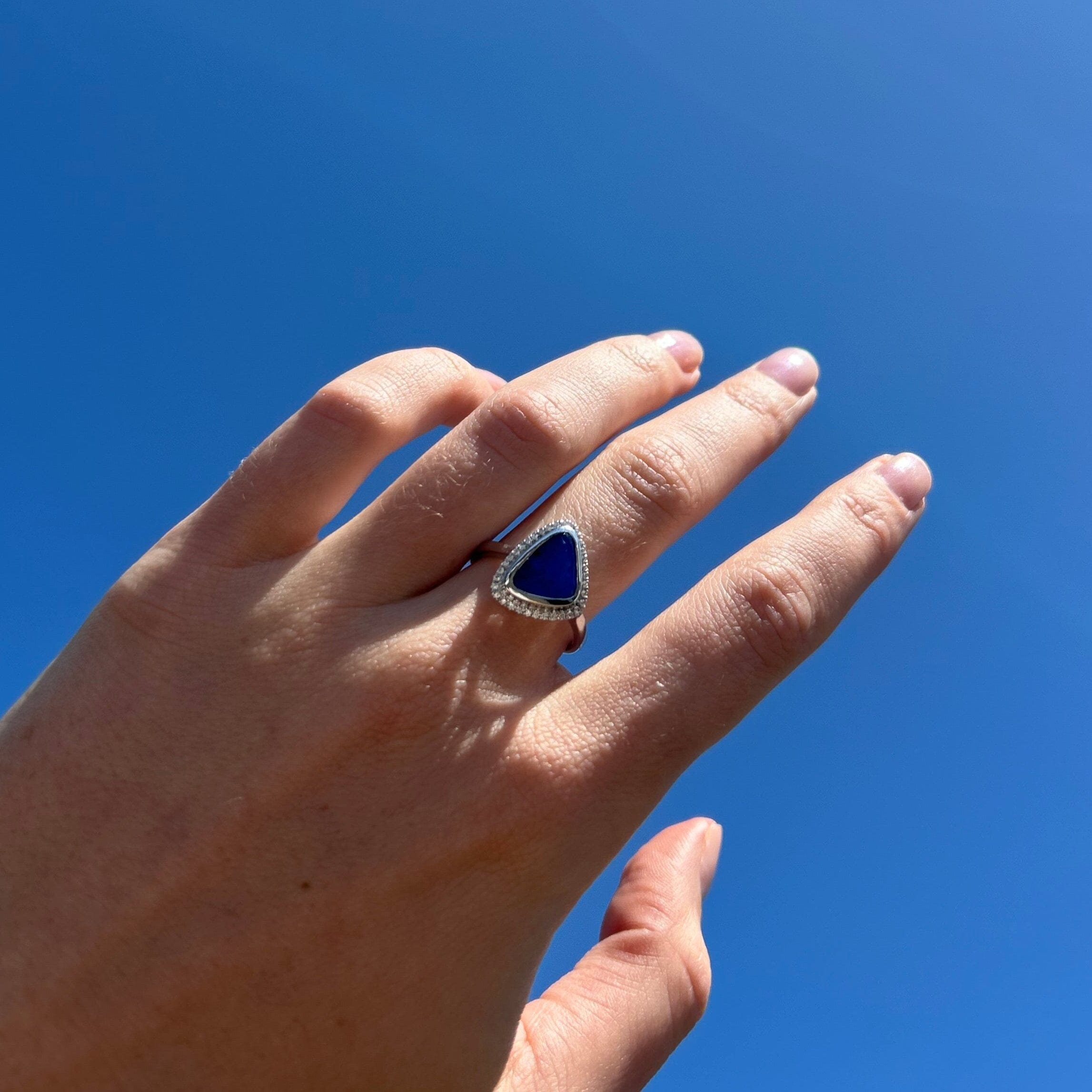 opal ring on model hand