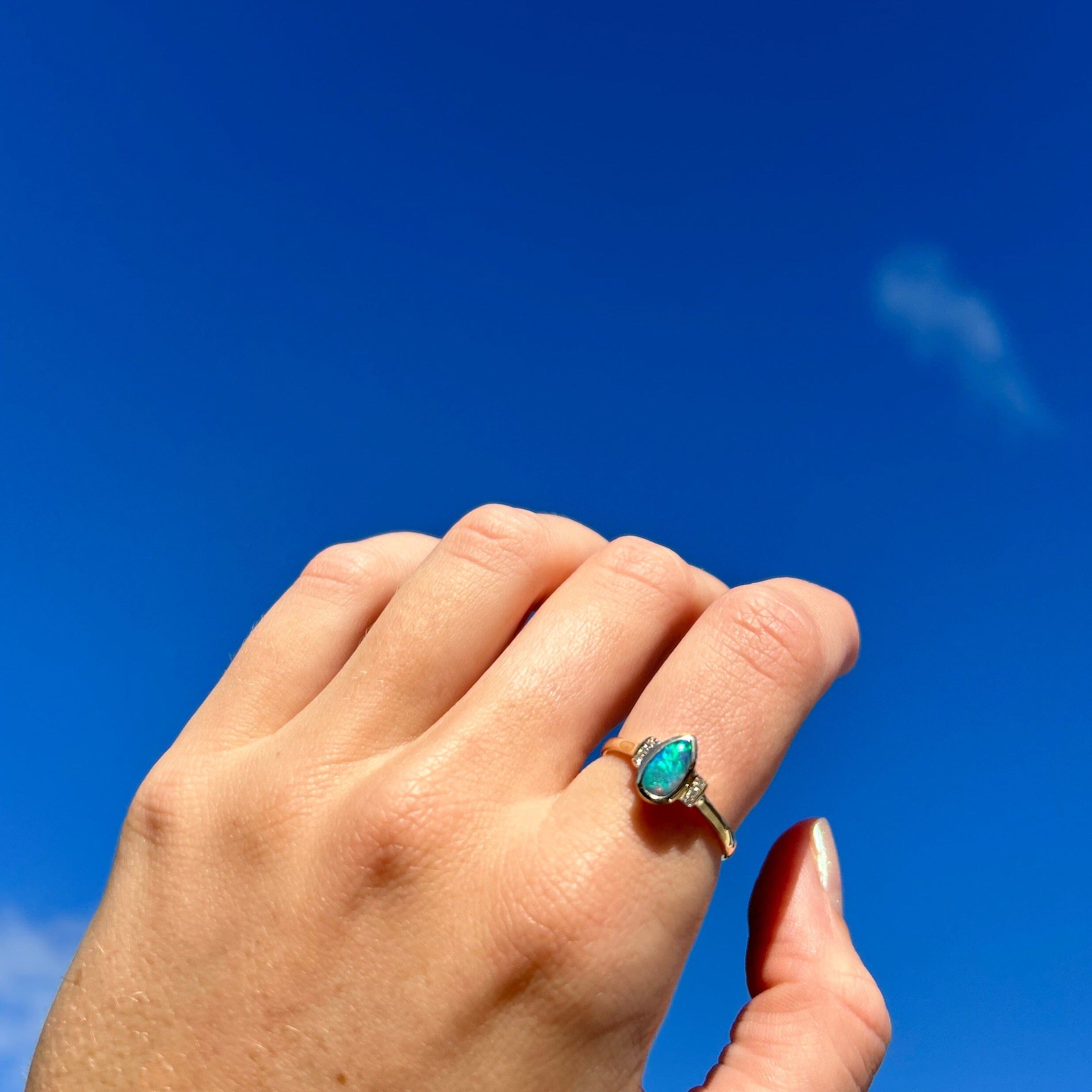 0.40ct Turquoise Solid Black Opal Ring