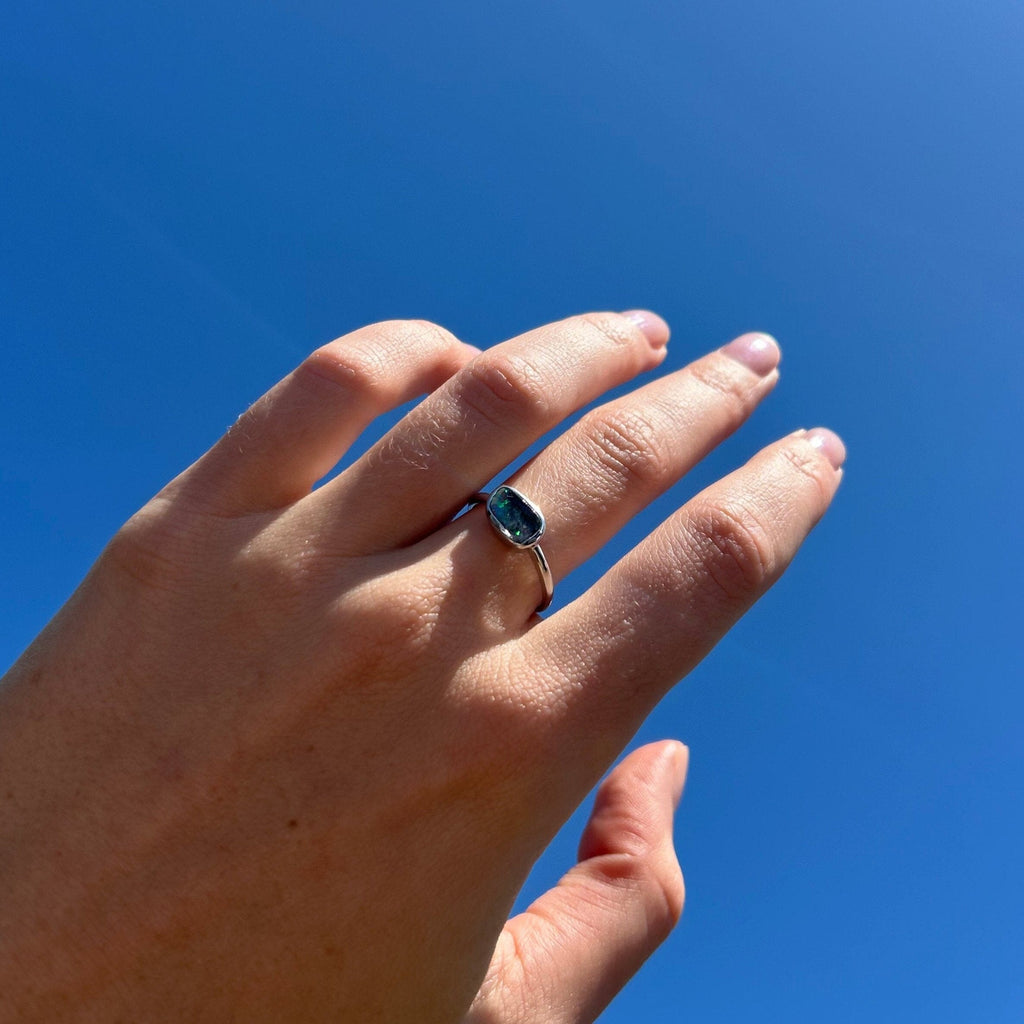 opal ring on model hand