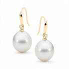 Large Edison Pearl earrings with gold hooks and diamond accents on a white background | Ikecho Australia