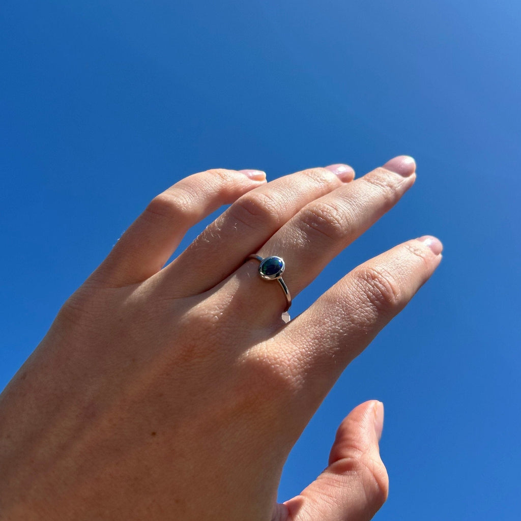 opal ring on model hand