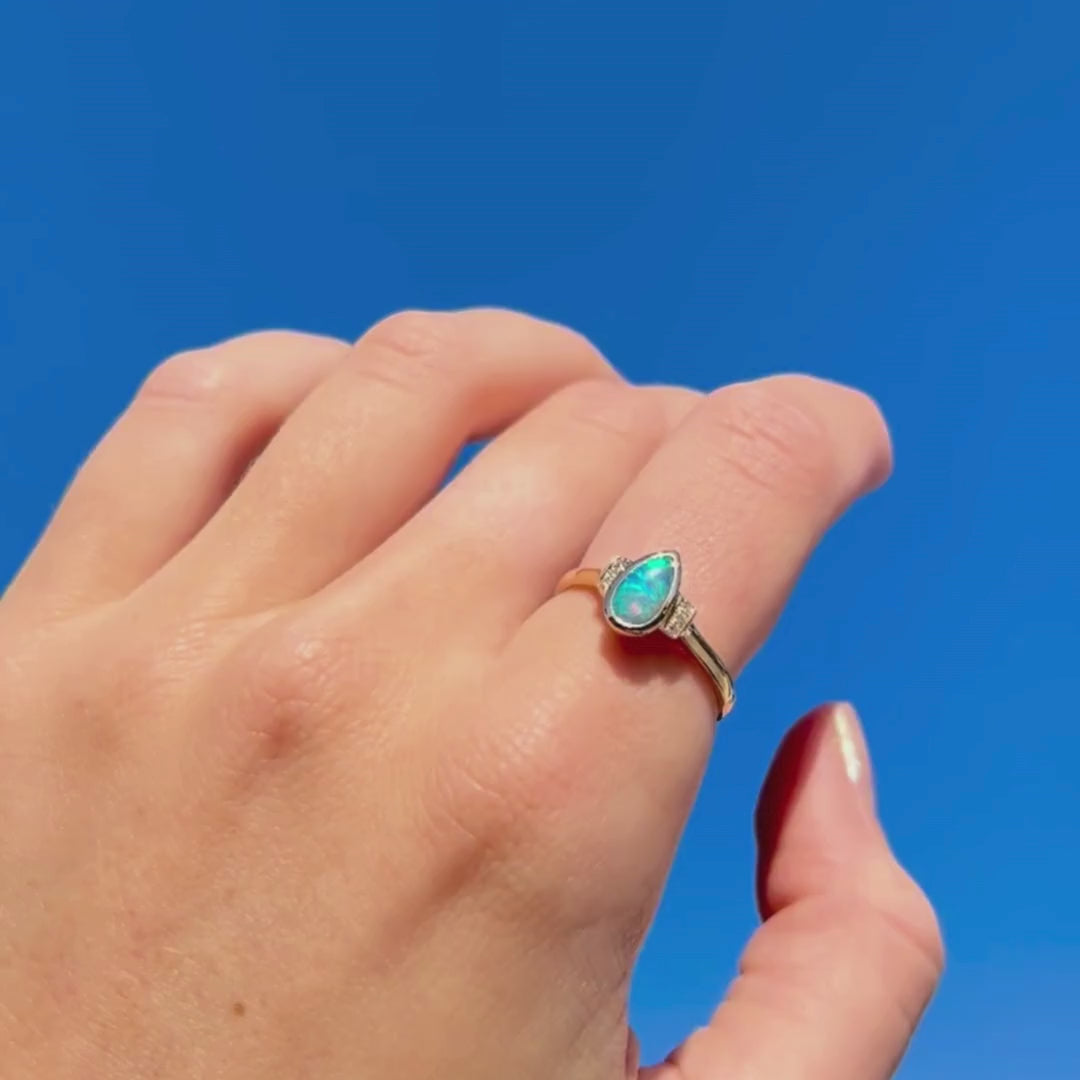 0.40ct Turquoise Solid Black Opal Ring