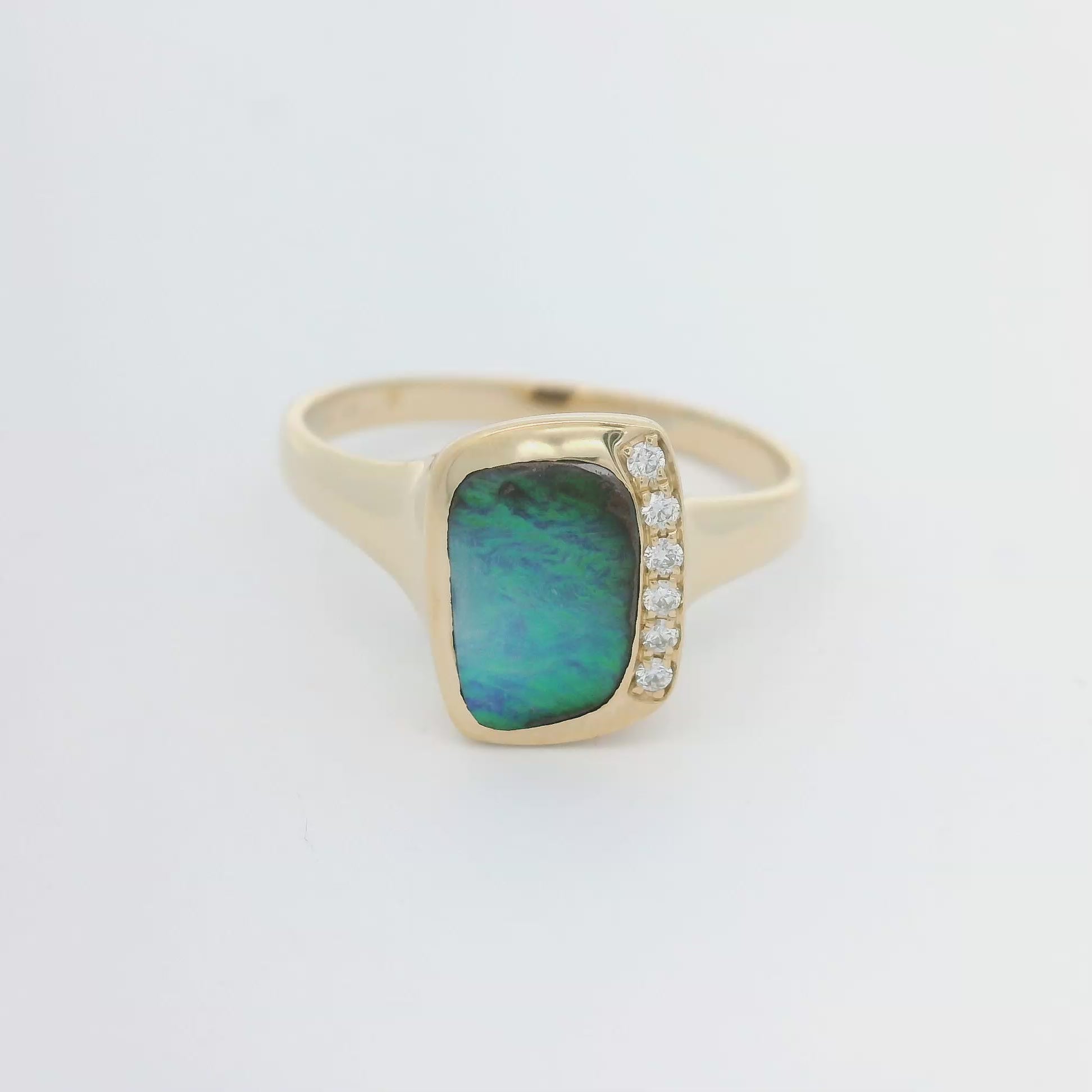 Light box video of blue and green opal ring with diamond accents | Ikecho Australia
